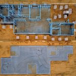 an aerial view of a construction site with concrete blocks